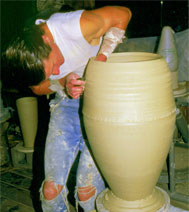 Dave Deal throwing large vase